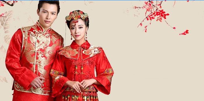 Kinijos liaudies kostiumų mergaitė ir vaikinas