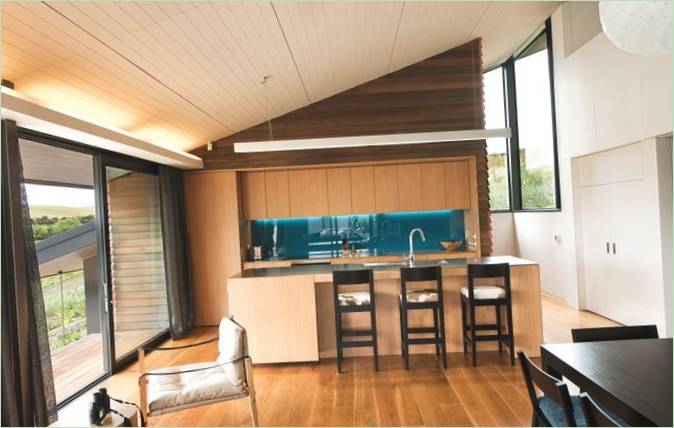 Naujosios Zelandijos Vanakos rezidencijos virtuvės su valgomuoju zonos interjero dizainas